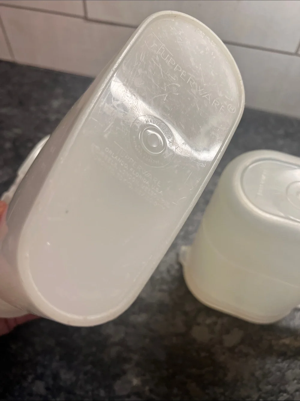 Tupperware 1 qt and a 2qt slim line beverage containers. Semi sheer Tight spaces
